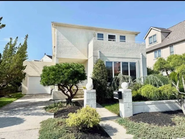 Curb Appeal & Entry before renovation — Margate Coastal Transformation