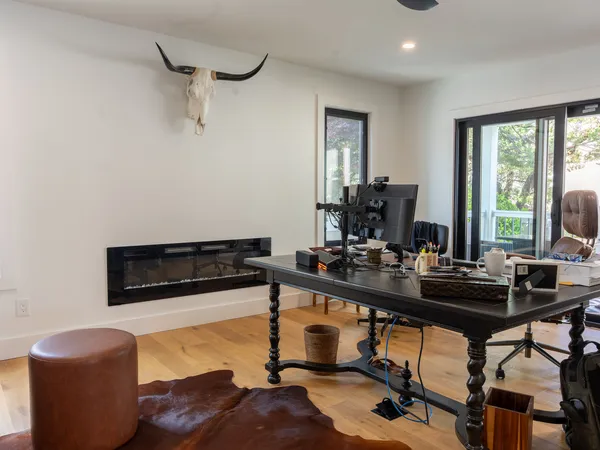Margate Coastal Transformation — Den with second linear fireplace